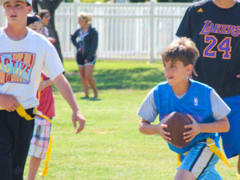 Campers playing flag football.