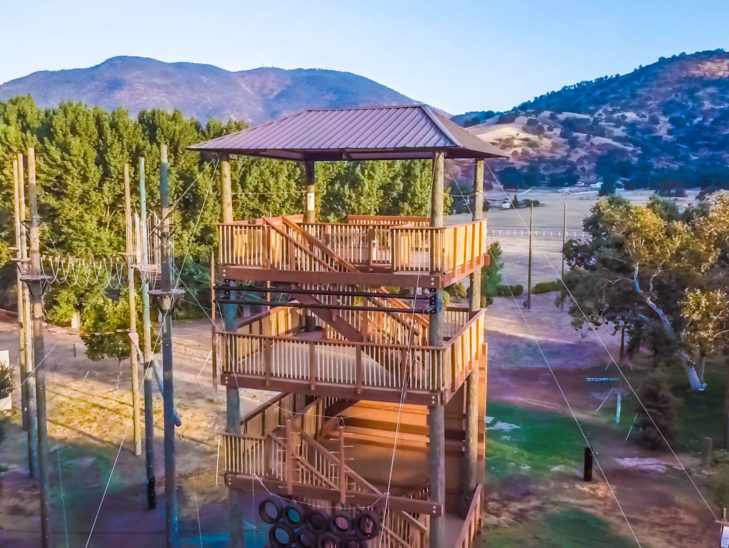 An aerial view of the ropes course on the River Way campus.